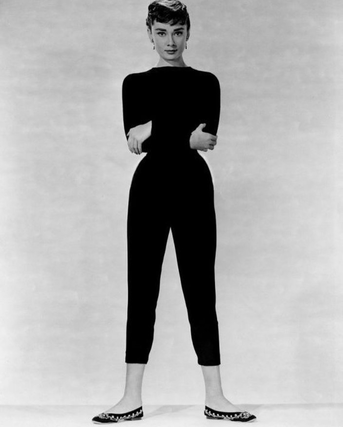 Audrey Hepburn wearing black capri