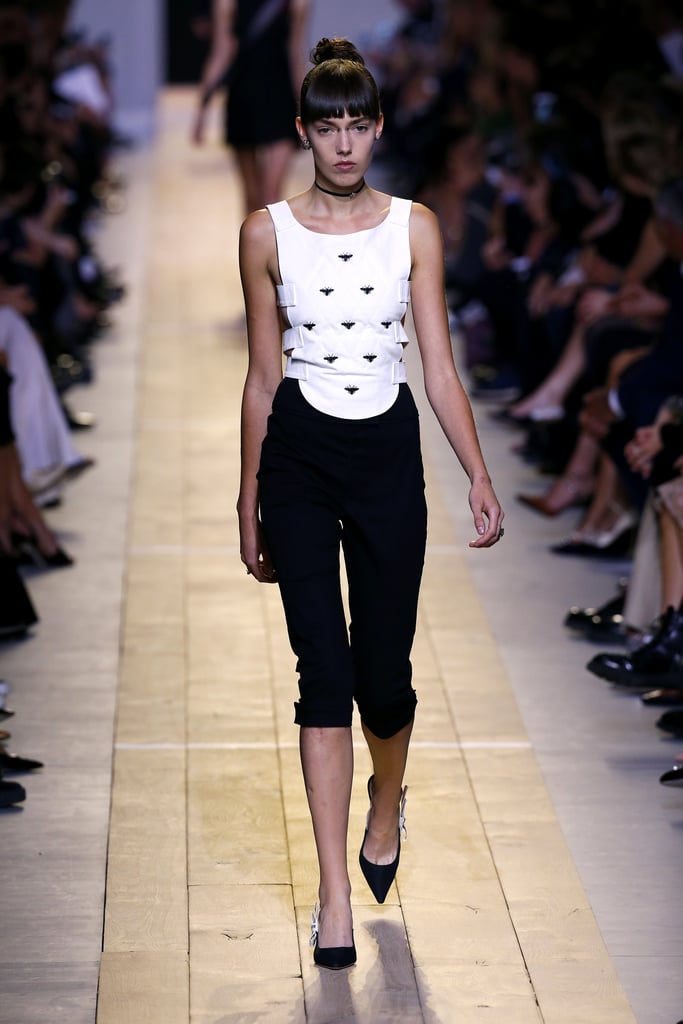 model wearing black capri spring collection