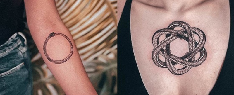 Hình tattoo rắn cắn đuôi má trong cánh tay và ở ngực trên